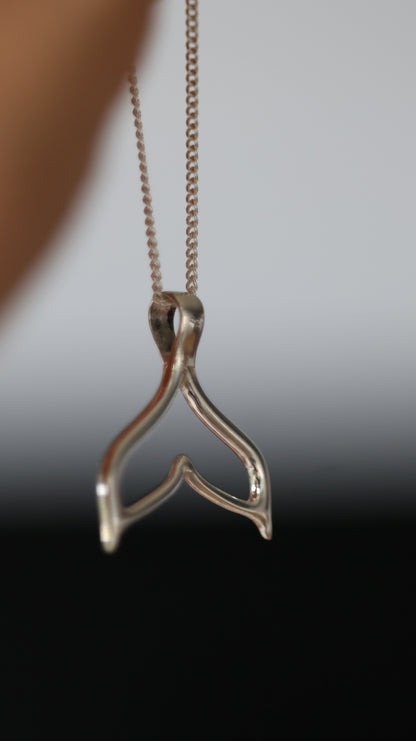 Whale tale pendant