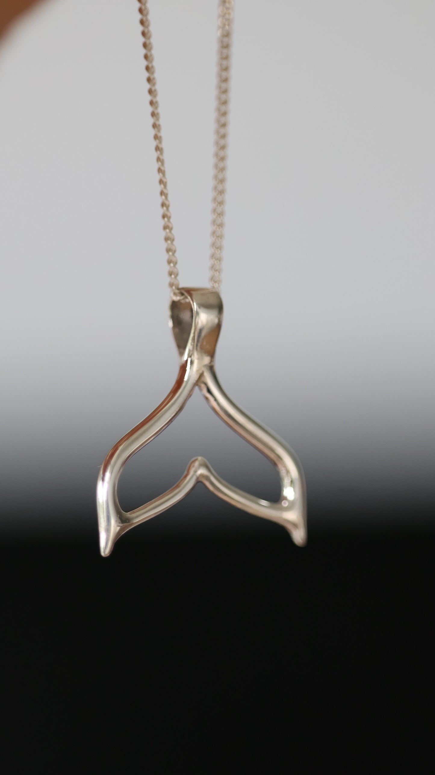Whale tale pendant