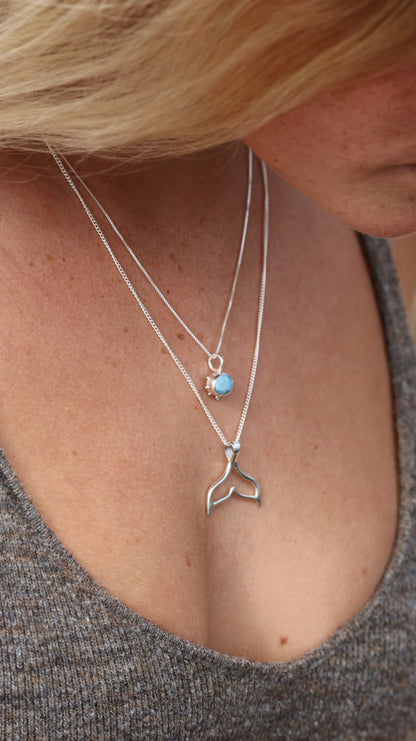 Whale tale pendant