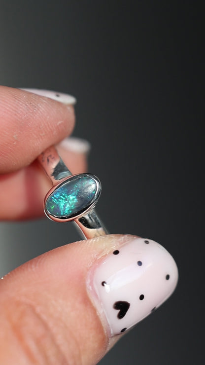 Solid semi-dark Lightning Ridge opal Ring
